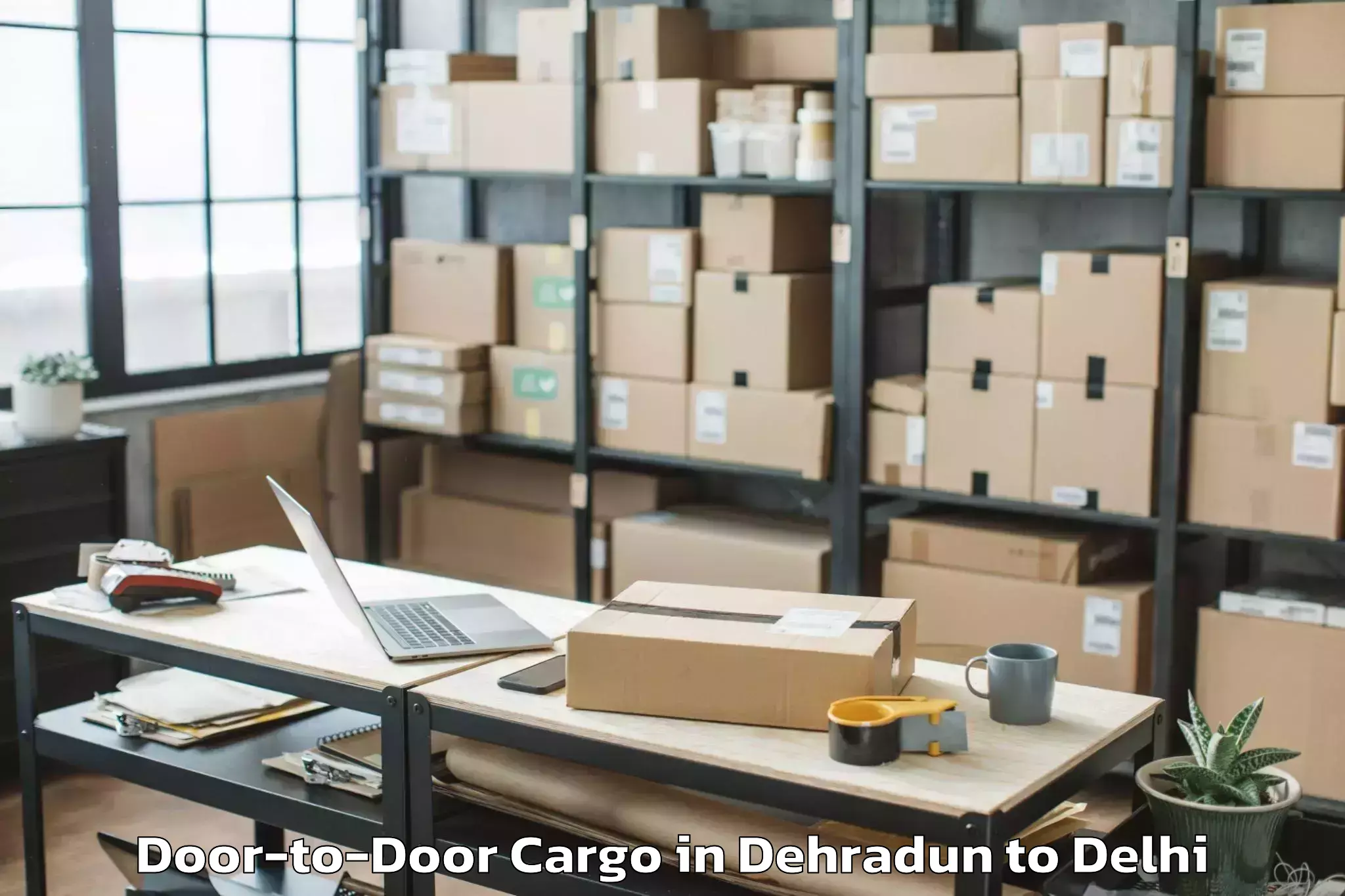 Reliable Dehradun to Karol Bagh Door To Door Cargo